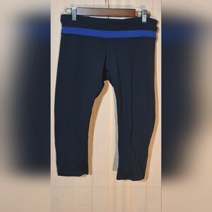Black Cropped Leggings with Blue Accent on Waistband